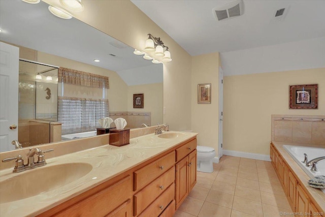 bathroom featuring tile patterned flooring, vaulted ceiling, visible vents, and a sink