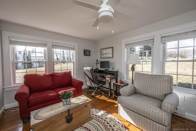 office with ceiling fan, wood finished floors, and baseboards