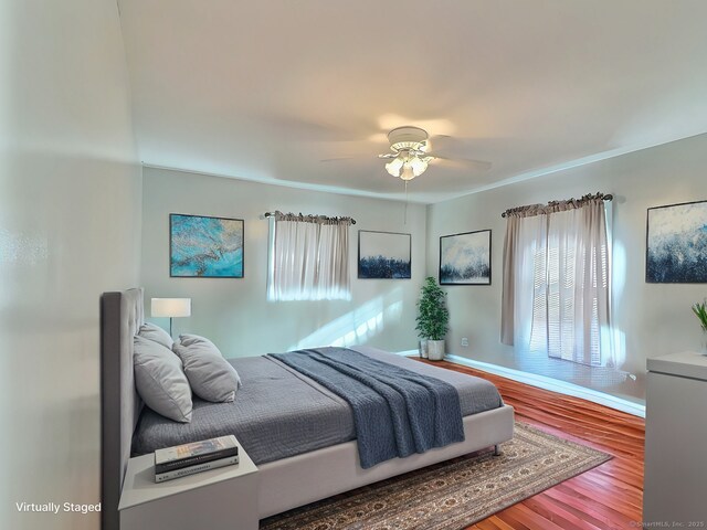 51 Milton Ave, Waterbury, CT 06706 - bedroom featuring a ceiling fan, baseboards, and wood finished floors