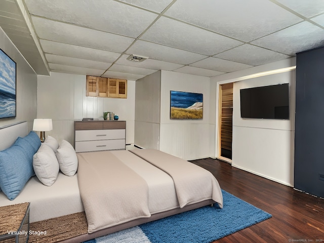 51 Milton Ave, Waterbury, CT 06706 - bedroom featuring a paneled ceiling, visible vents, and wood finished floors