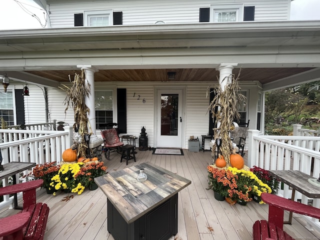 wooden deck featuring a porch