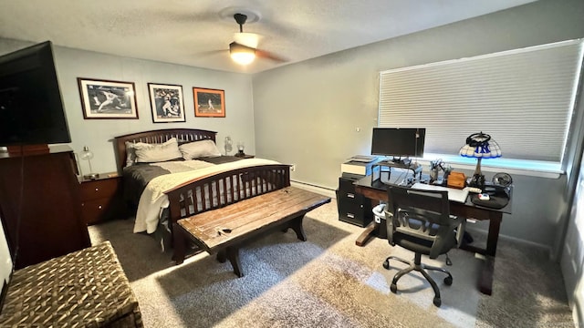 bedroom with baseboards, carpet flooring, ceiling fan, and baseboard heating