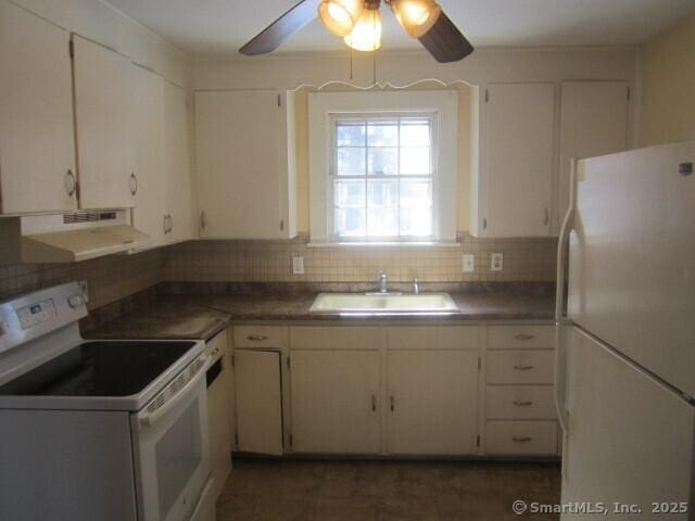 242 Elm St, Enfield, CT 06082 - kitchen with white appliances, under cabinet range hood, a sink, ceiling fan, and backsplash