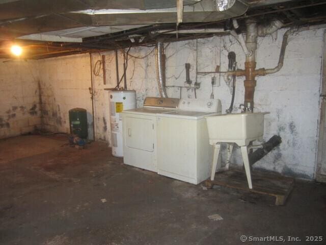 242 Elm St, Enfield, CT 06082 - unfinished below grade area with water heater, washer and clothes dryer, and a sink