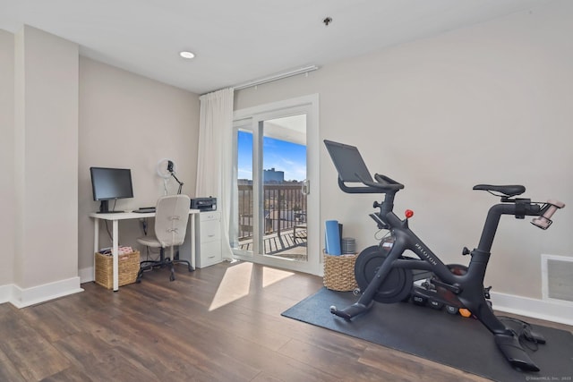 workout area with recessed lighting, wood finished floors, visible vents, and baseboards