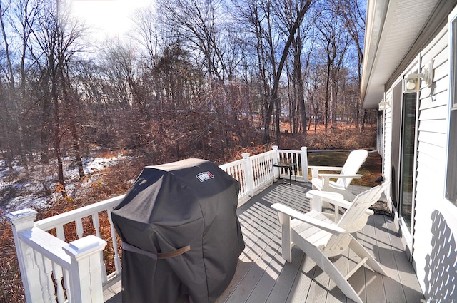 wooden terrace with grilling area