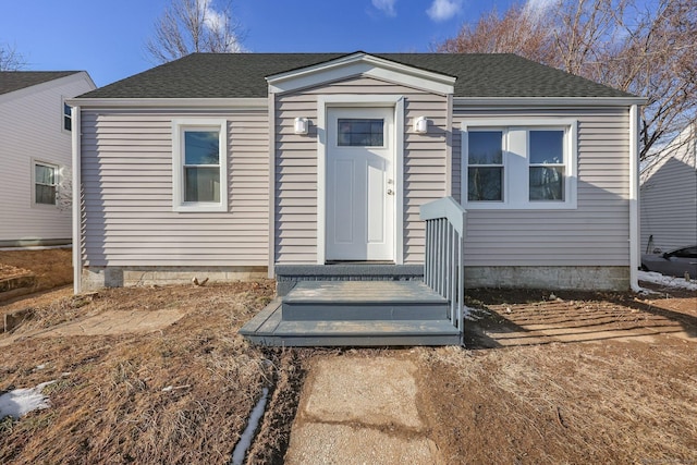 bungalow with roof with shingles