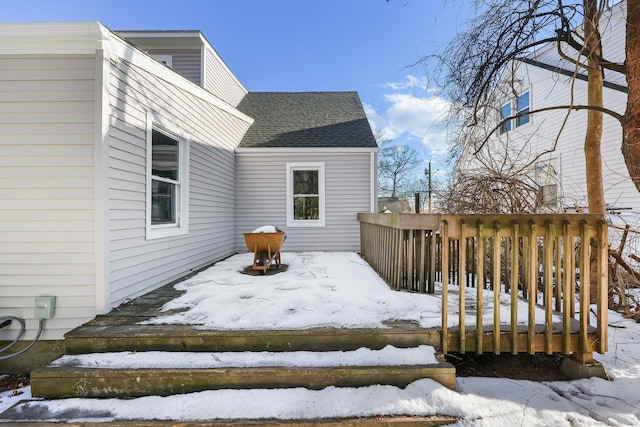 view of snow covered deck