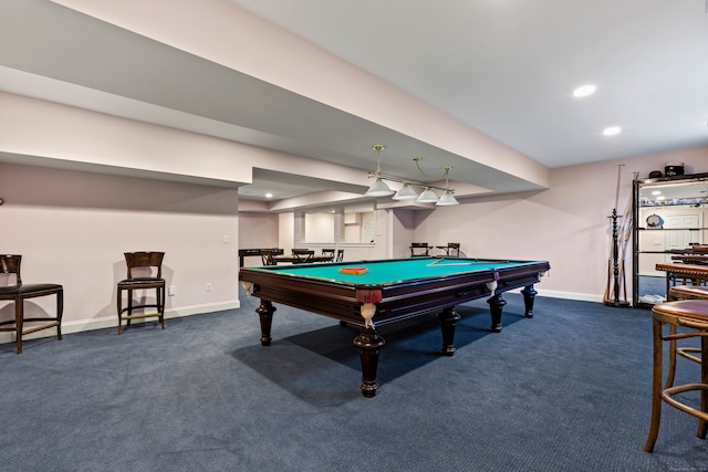 recreation room with dark colored carpet, recessed lighting, and baseboards