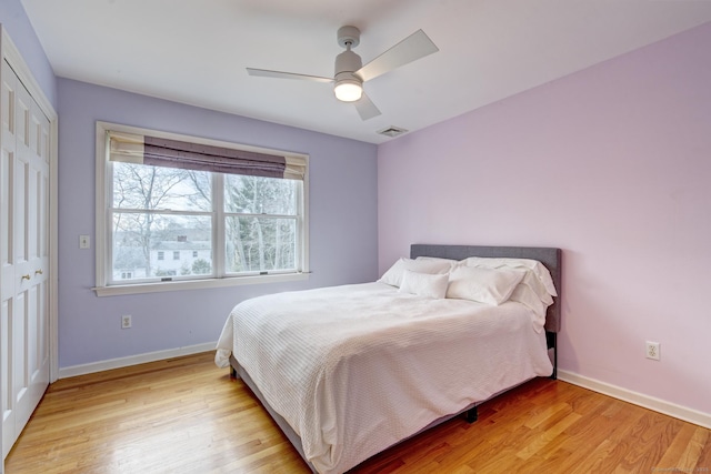 37 Skyline Dr, Groton, CT 06340 - bedroom featuring light wood-type flooring, a closet, and a ceiling fan