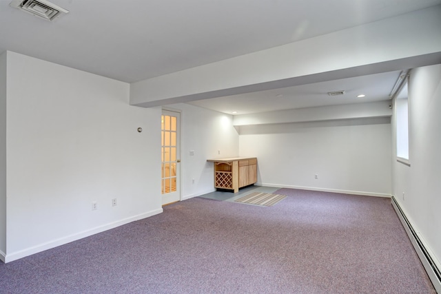 37 Skyline Dr, Groton, CT 06340 - below grade area with a baseboard radiator, carpet floors, and recessed lighting