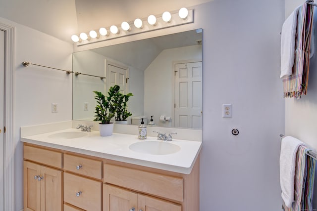 37 Skyline Dr, Groton, CT 06340 - bathroom with double vanity and vaulted ceiling