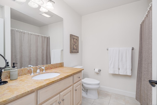 full bath featuring visible vents, toilet, vanity, baseboards, and tile patterned floors