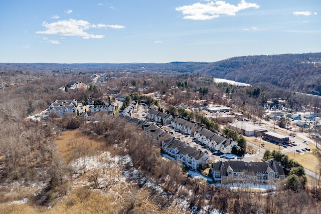 aerial view featuring a residential view and a view of trees