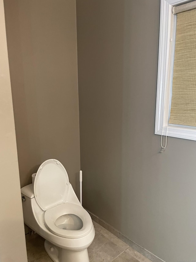 2660 N Ave Unit 110, Bridgeport, CT 06604 - bathroom featuring toilet and baseboards