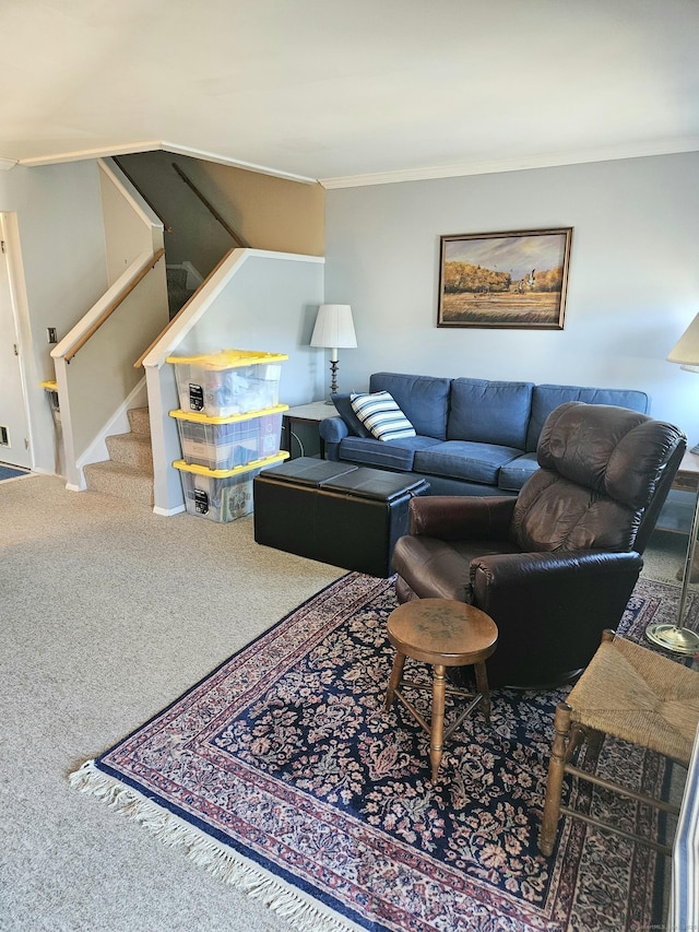 carpeted living area with stairs and ornamental molding