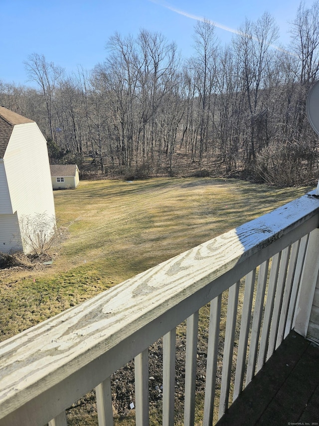 view of yard with a storage shed and an outdoor structure