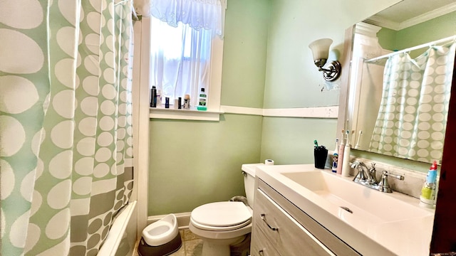 full bath featuring toilet, curtained shower, crown molding, and vanity