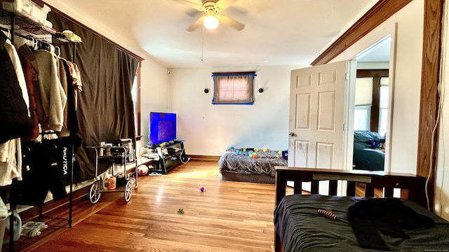 bedroom featuring wood finished floors