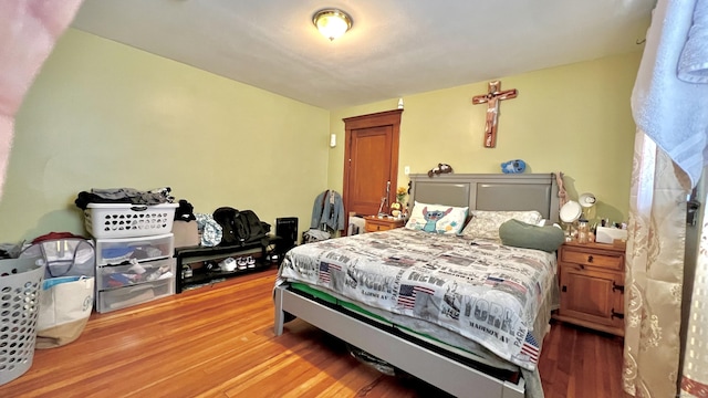 bedroom with light wood finished floors