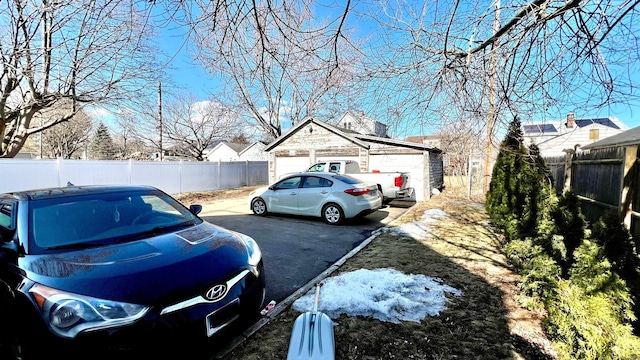 view of yard with an outbuilding and fence