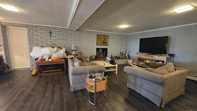 living area with wood finished floors, a fireplace, and ornamental molding