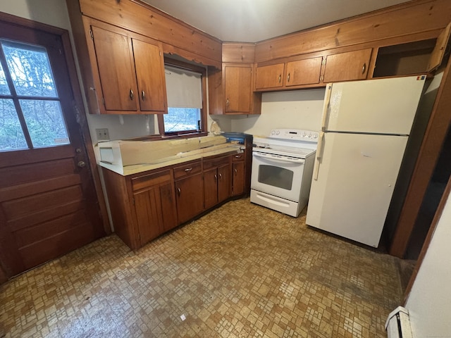 kitchen featuring light countertops, white appliances, and brown cabinets