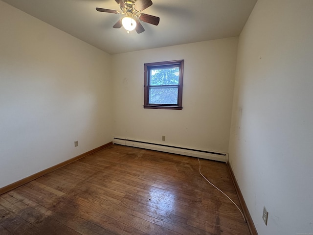 empty room featuring a ceiling fan, a baseboard radiator, baseboards, and hardwood / wood-style floors