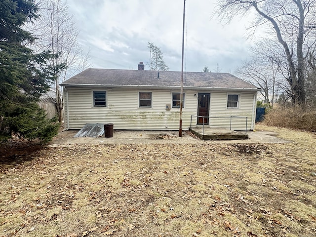 rear view of property with a patio area