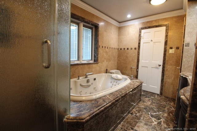 bathroom with a stall shower, a tub with jets, and ornamental molding