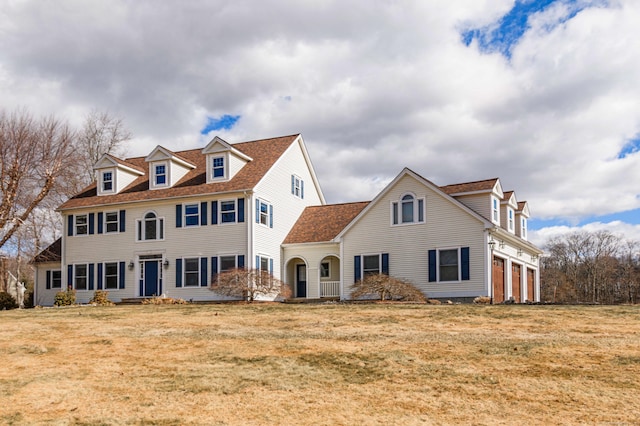 view of front of property with a front lawn