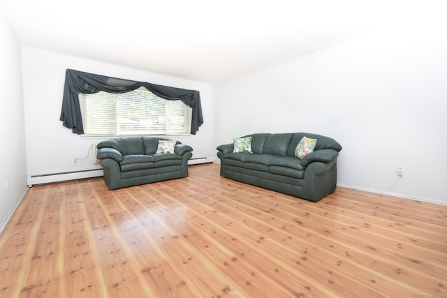 333 Vincellette St Unit 16, Bridgeport, CT 06606 - living room with a baseboard heating unit and wood finished floors