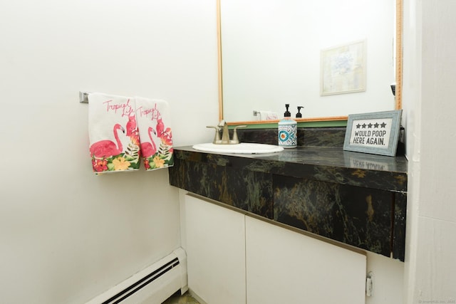 333 Vincellette St Unit 16, Bridgeport, CT 06606 - bathroom with a baseboard heating unit and vanity