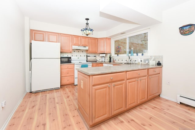 333 Vincellette St Unit 16, Bridgeport, CT 06606 - kitchen featuring white appliances, under cabinet range hood, a sink, light wood-type flooring, and a peninsula