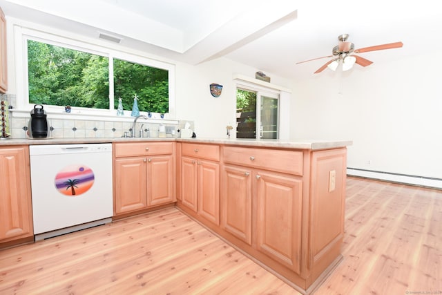 333 Vincellette St Unit 16, Bridgeport, CT 06606 - kitchen featuring white dishwasher, plenty of natural light, light wood finished floors, and decorative backsplash