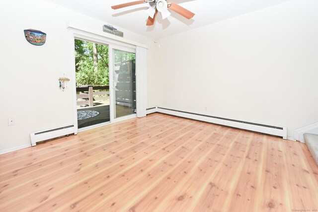 333 Vincellette St Unit 16, Bridgeport, CT 06606 - unfurnished room featuring a baseboard heating unit, wood finished floors, and ceiling fan
