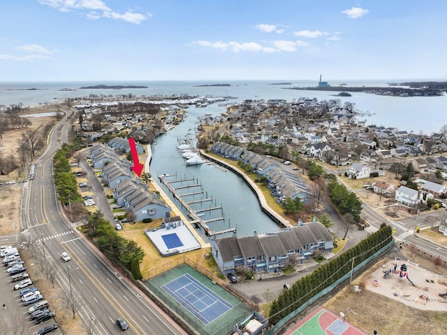 birds eye view of property featuring a water view