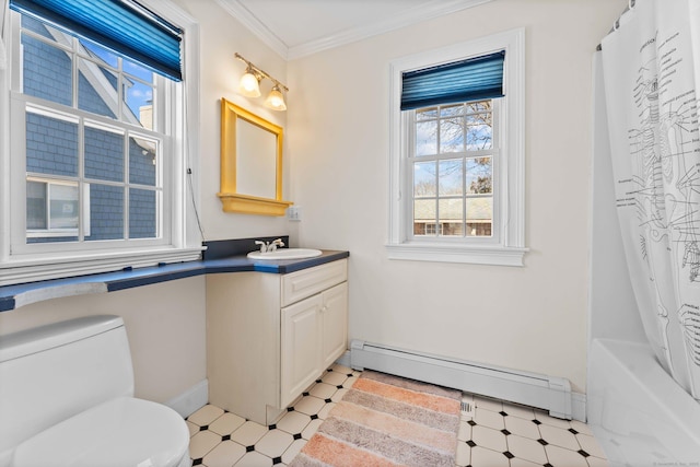 bathroom featuring crown molding, toilet, baseboard heating, tile patterned floors, and vanity