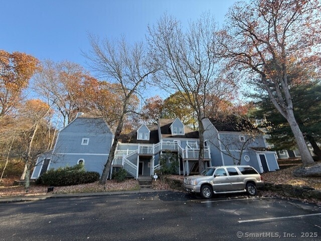 view of front of house with stairway