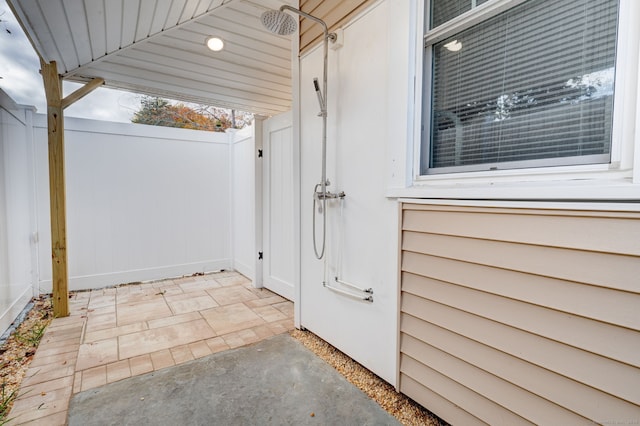 view of patio with fence