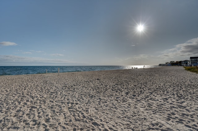 view of water feature with a beach view