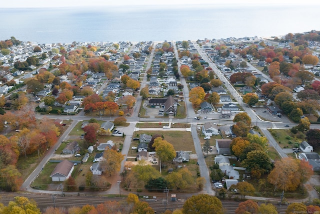 aerial view with a residential view and a water view