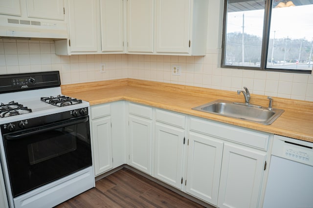 kitchen with white dishwasher, under cabinet range hood, a sink, range with gas stovetop, and light countertops