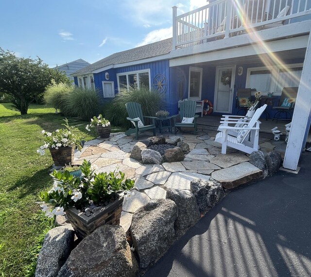 view of patio / terrace with a balcony