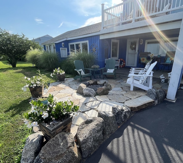 view of patio / terrace featuring a balcony