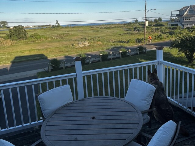 deck with outdoor dining space