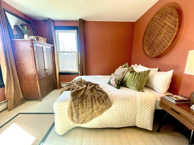 bedroom with light wood-style floors