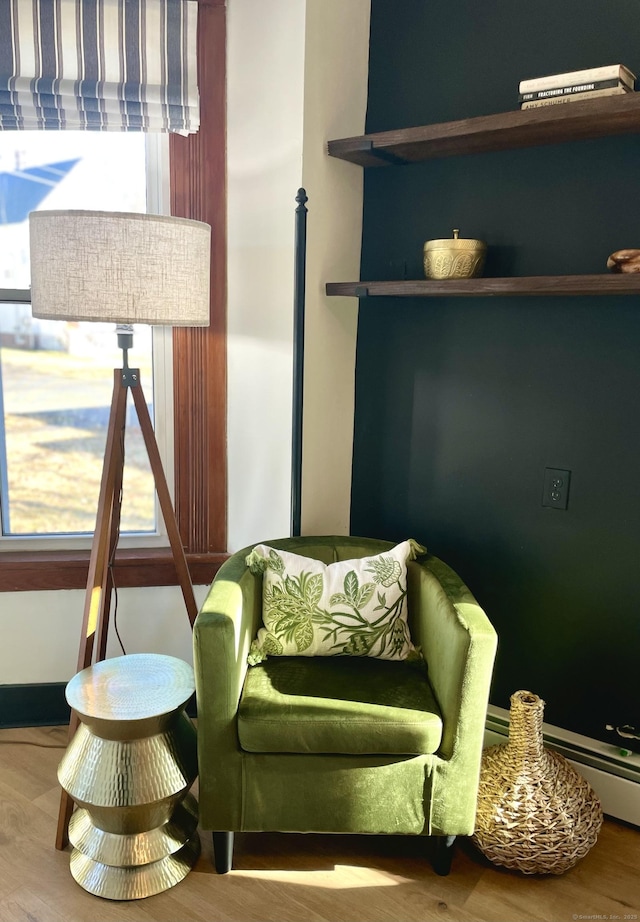 sitting room with wood finished floors