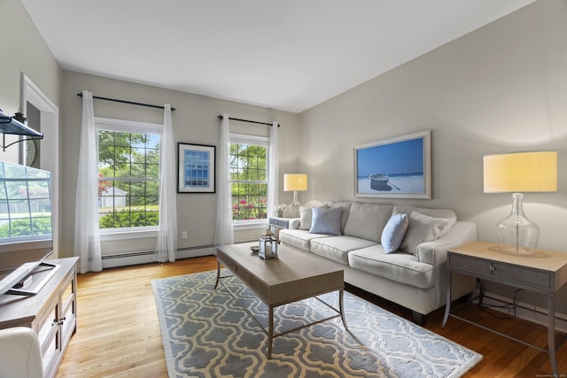 3 Spencer Ct, Clinton, CT 06413 - living room featuring light wood-type flooring and baseboard heating