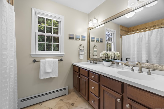 3 Spencer Ct, Clinton, CT 06413 - full bathroom with a baseboard radiator, double vanity, tile patterned floors, a shower with shower curtain, and baseboards